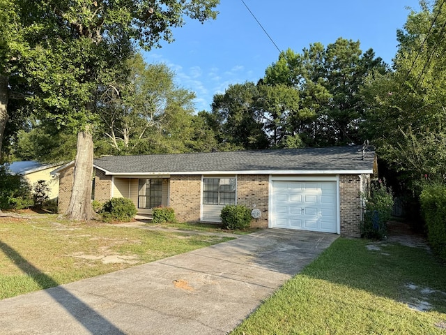 2419 Creekwood Dr, Dothan, AL 36301 - single story home featuring a front yard, driveway, brick siding, and a garage