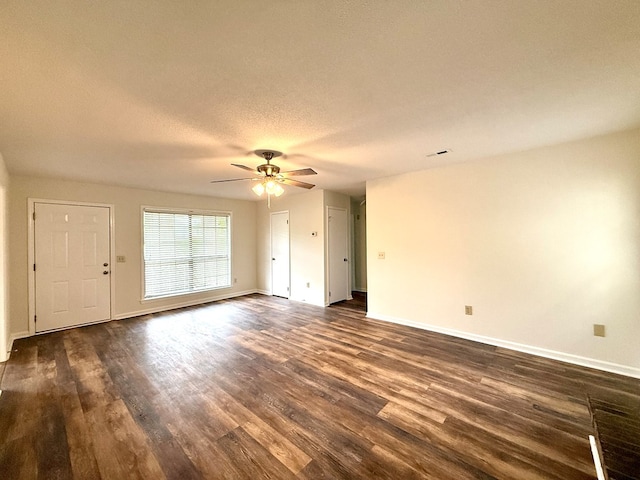 2419 Creekwood Dr, Dothan, AL 36301 - unfurnished room featuring dark wood-style floors, ceiling fan, and a textured ceiling