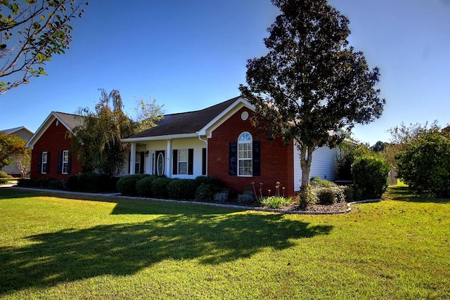 ranch-style home with a front yard