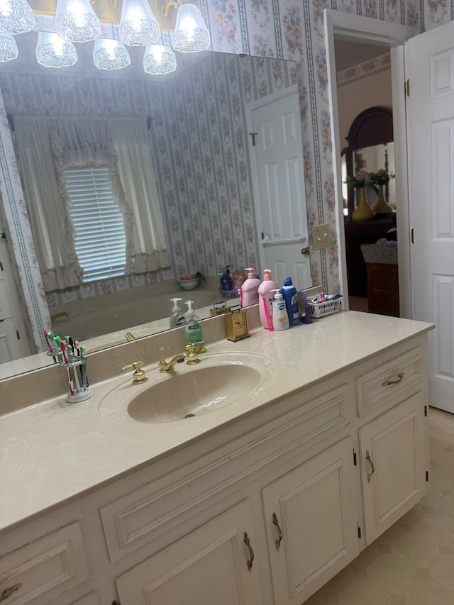 104 Wellston Ct, Dothan, AL 36305 - bathroom featuring wallpapered walls, vanity, and a chandelier