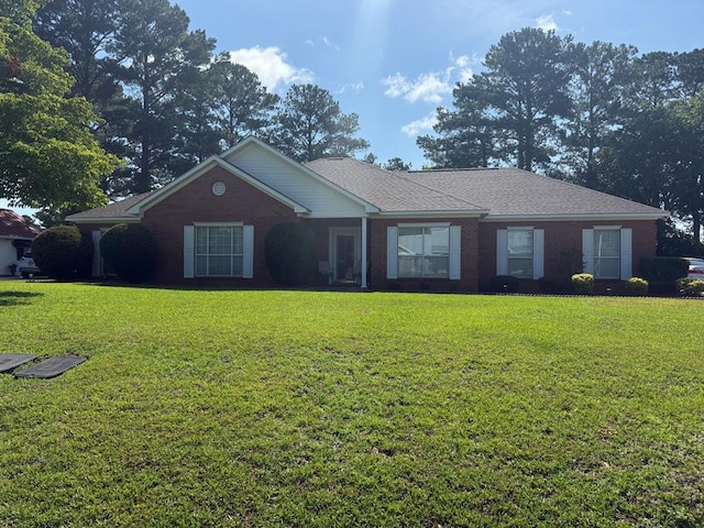 104 Wellston Ct, Dothan, AL 36305 - ranch-style house featuring a front yard