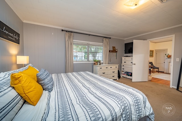 carpeted bedroom featuring crown molding