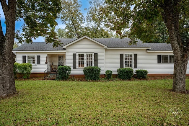 view of front of property with a front lawn