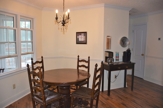 3374 Lake Oak Ridge Dr, Enterprise, AL 36330 - dining room featuring dark wood-style floors, plenty of natural light, a chandelier, crown molding, and baseboards