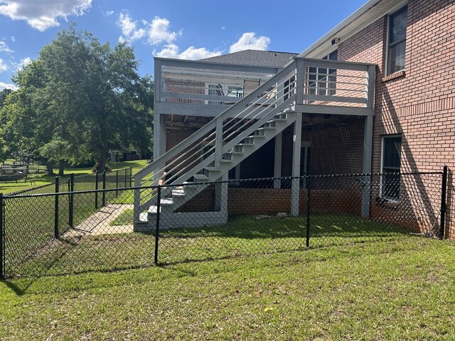 3374 Lake Oak Ridge Dr, Enterprise, AL 36330 - back of property featuring brick siding, a wooden deck, and stairs