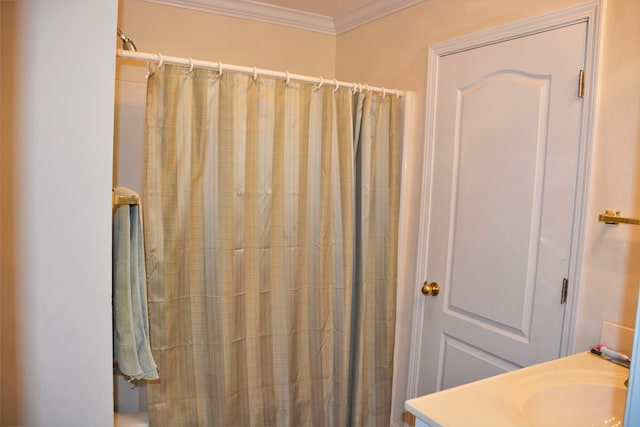 3374 Lake Oak Ridge Dr, Enterprise, AL 36330 - bathroom featuring ornamental molding, a shower with shower curtain, and a sink