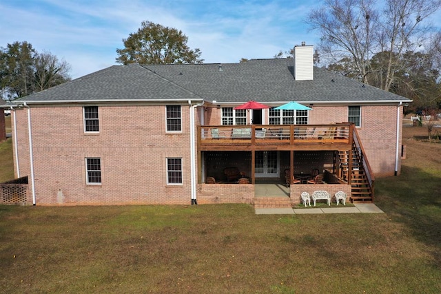 3374 Lake Oak Ridge Dr, Enterprise, AL 36330 - rear view of house featuring a deck, stairs, a patio, a chimney, and brick siding