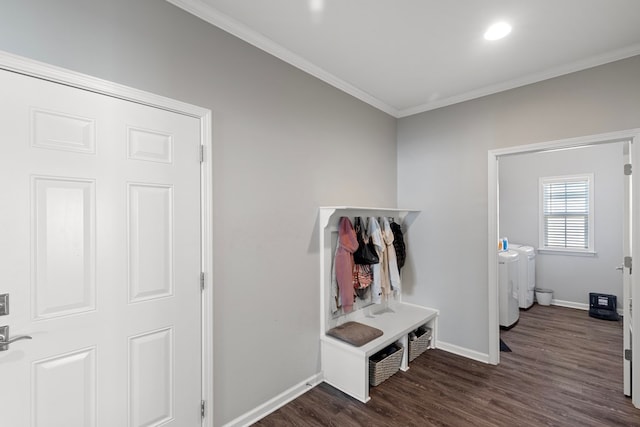 mudroom featuring dark hardwood / wood-style floors, washer and dryer, and ornamental molding