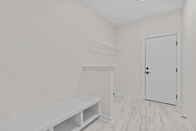 mudroom featuring baseboards