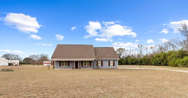 view of front facade featuring a front yard and a porch