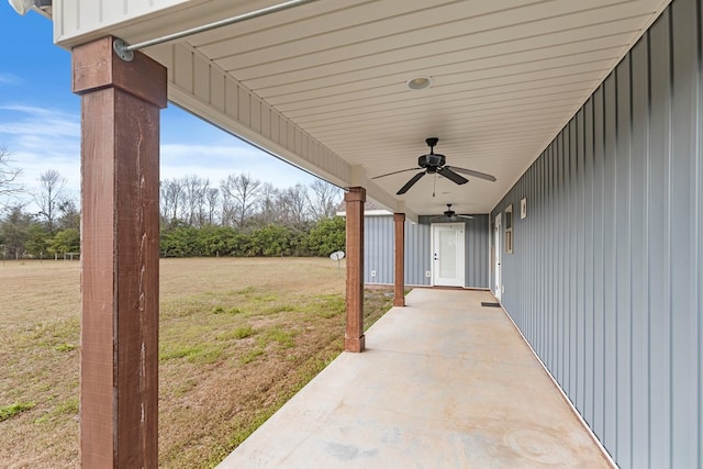 view of patio featuring ceiling fan