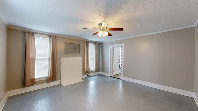 431 E Eufaula St, Ozark, AL 36360 - spare room with plenty of natural light, hardwood / wood-style floors, ceiling fan, crown molding, and a textured ceiling