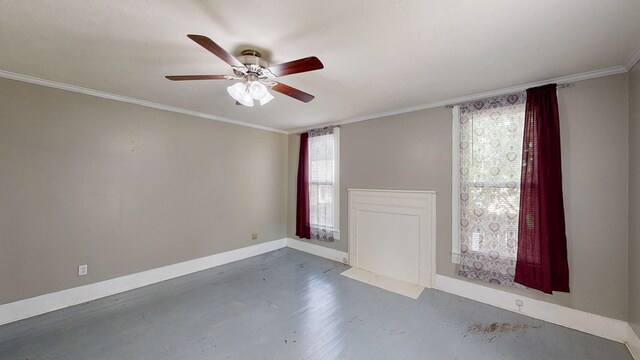 431 E Eufaula St, Ozark, AL 36360 - spare room with healthy amount of natural light, ceiling fan, baseboards, and crown molding