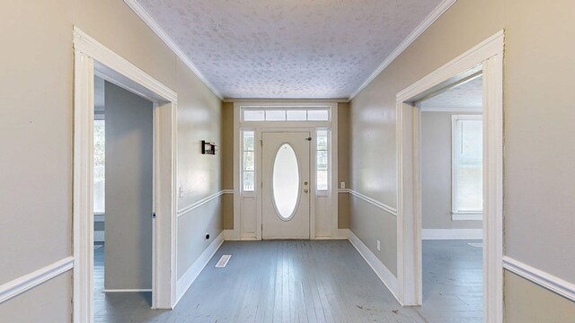 431 E Eufaula St, Ozark, AL 36360 - foyer entrance with ornamental molding, wood-type flooring, and baseboards