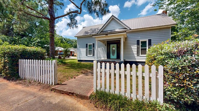 431 E Eufaula St, Ozark, AL 36360 - bungalow-style house with metal roof