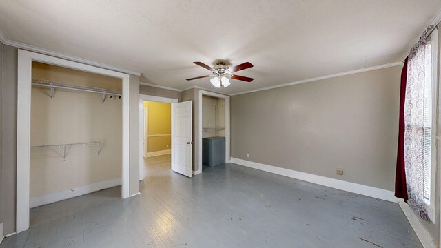 431 E Eufaula St, Ozark, AL 36360 - unfurnished bedroom featuring ornamental molding, a closet, baseboards, and a ceiling fan