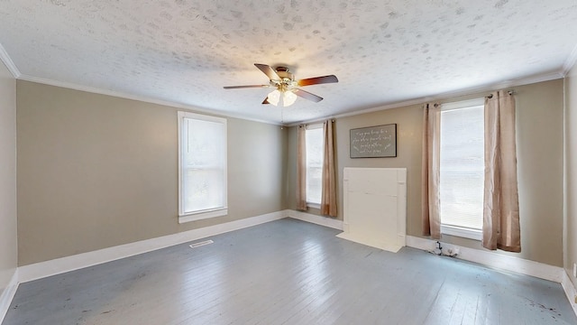 431 E Eufaula St, Ozark, AL 36360 - empty room with ceiling fan, wood-type flooring, baseboards, a textured ceiling, and ornamental molding