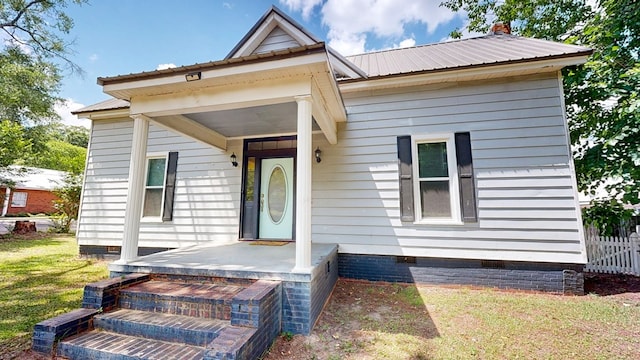 431 E Eufaula St, Ozark, AL 36360 - view of front of property featuring crawl space and metal roof