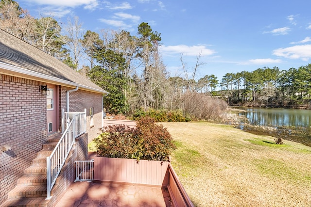 view of yard with a water view