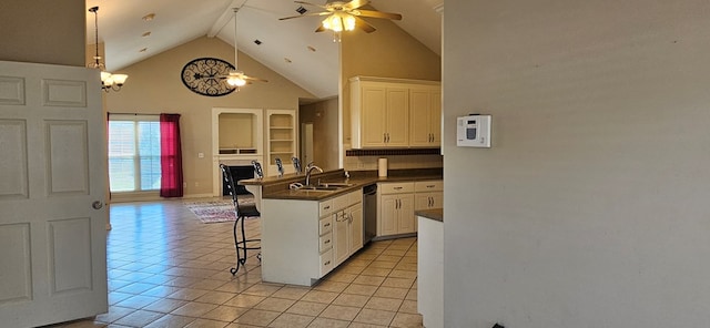 kitchen featuring white cabinetry, a breakfast bar area, high vaulted ceiling, and light tile patterned flooring