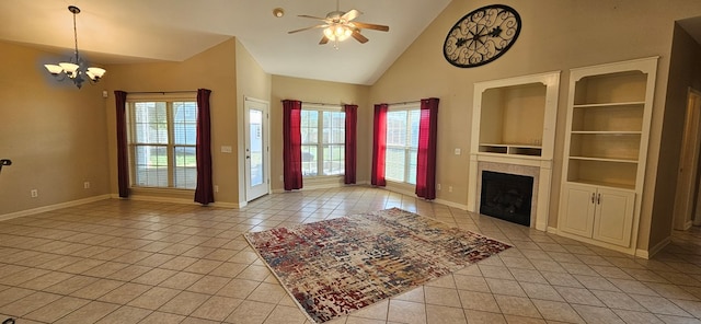 unfurnished living room featuring high vaulted ceiling, ceiling fan with notable chandelier, built in features, and light tile patterned floors