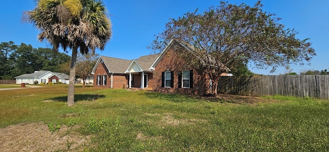 view of front of home featuring a front lawn