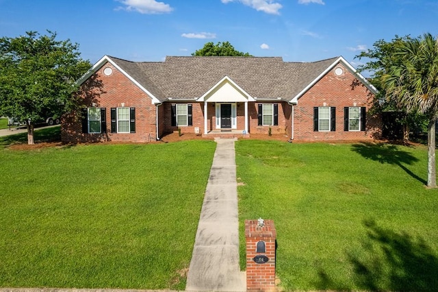 single story home with a front lawn