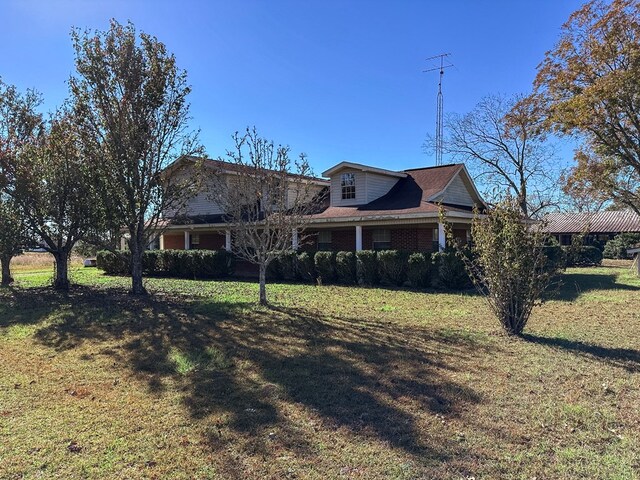 view of front of home with a front yard