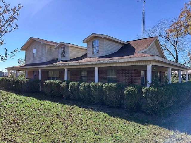 view of property exterior featuring a lawn