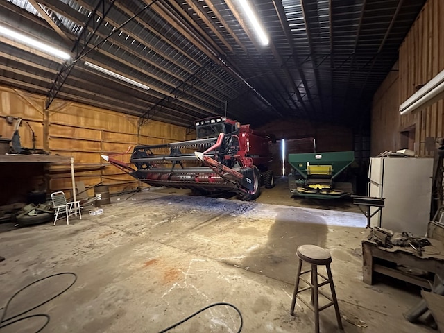 garage featuring white fridge