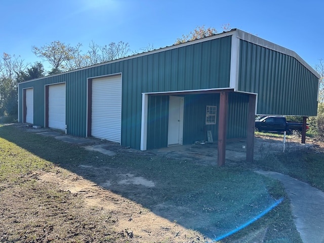 view of outbuilding featuring a garage