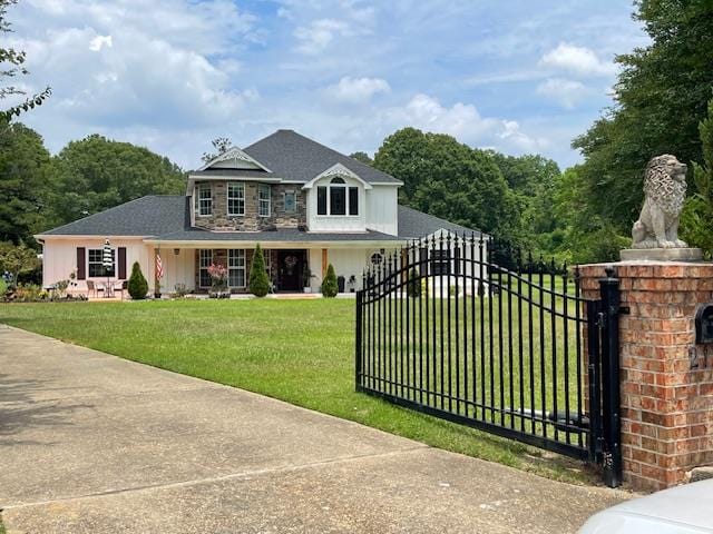 view of front of home with a front lawn