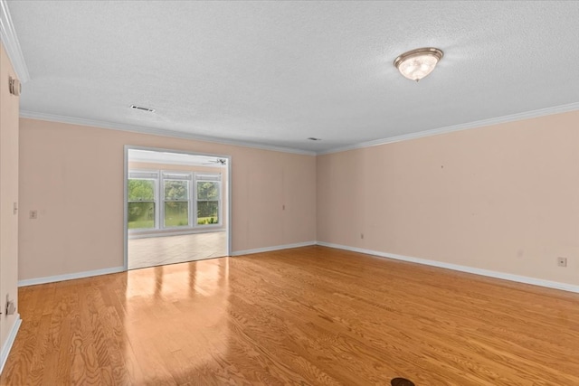 105 Christen Ln, Dothan, AL 36305 - unfurnished room with baseboards, crown molding, wood finished floors, and a textured ceiling