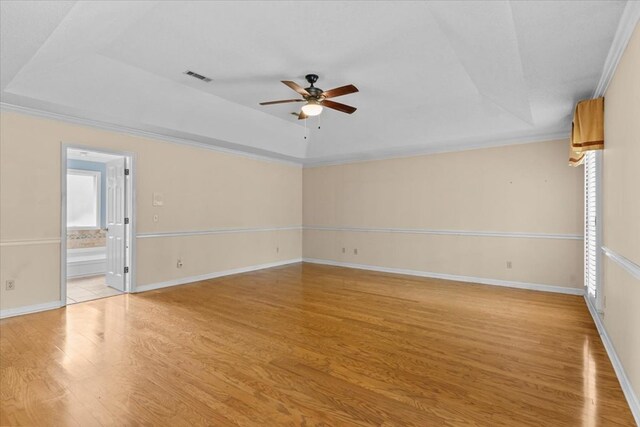 105 Christen Ln, Dothan, AL 36305 - unfurnished room with a ceiling fan, a raised ceiling, light wood-style floors, and visible vents