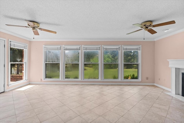 105 Christen Ln, Dothan, AL 36305 - unfurnished living room featuring a ceiling fan, ornamental molding, a fireplace with flush hearth, and light tile patterned floors