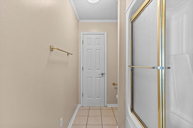 105 Christen Ln, Dothan, AL 36305 - doorway to outside with light tile patterned floors, ornamental molding, baseboards, and a textured ceiling