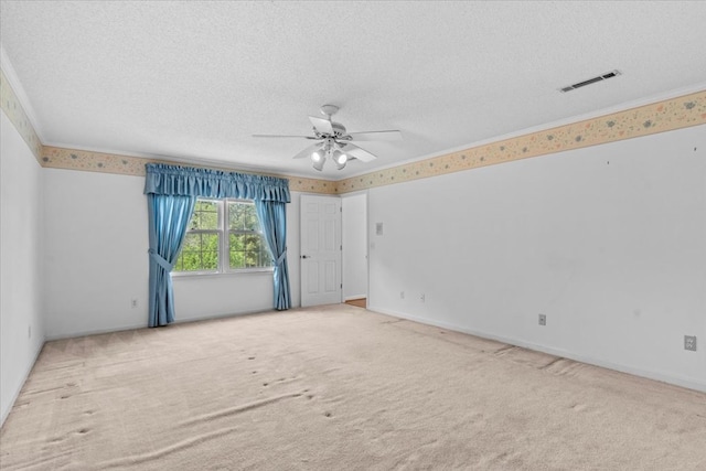105 Christen Ln, Dothan, AL 36305 - carpeted spare room featuring a textured ceiling, visible vents, a ceiling fan, and ornamental molding