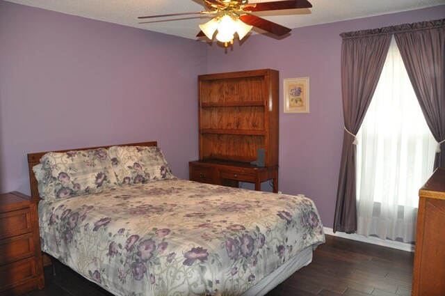 bedroom featuring dark wood-type flooring and sink