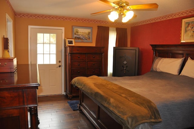 bedroom featuring dark hardwood / wood-style floors and ceiling fan