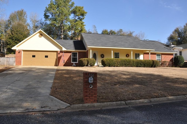 ranch-style home featuring a garage