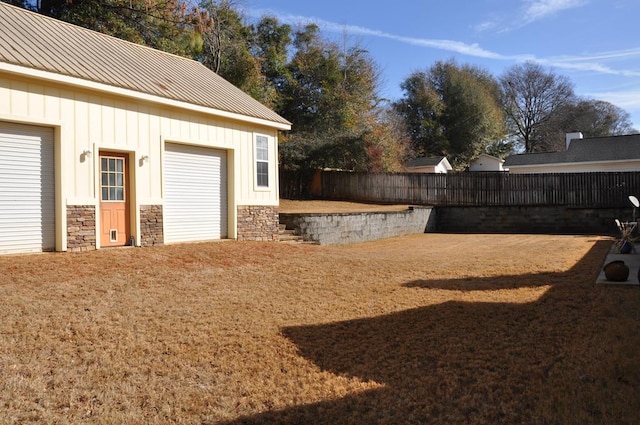 view of yard with a garage