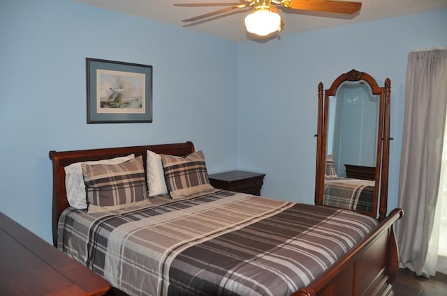 bedroom featuring ceiling fan