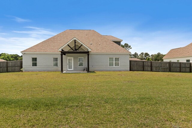 114 Bozeman Way, Dothan, AL 36305 - rear view of house with a patio area, a shingled roof, and stucco siding