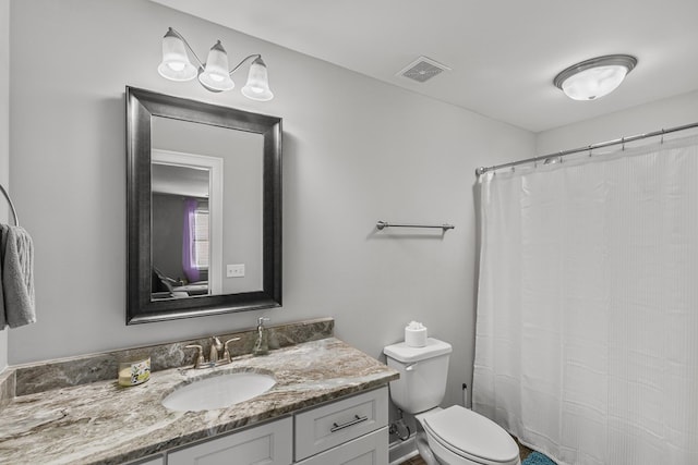 114 Bozeman Way, Dothan, AL 36305 - full bathroom with vanity, toilet, and a shower with curtain
