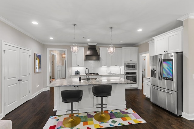114 Bozeman Way, Dothan, AL 36305 - kitchen featuring stainless steel appliances, premium range hood, white cabinets, a chandelier, and a sink