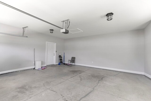 114 Bozeman Way, Dothan, AL 36305 - garage with a garage door opener and baseboards