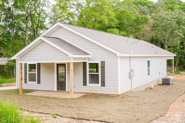 NHN3 S Watford Rd, Slocomb, AL 36375 - rear view of house featuring roof with shingles, central AC, and a patio