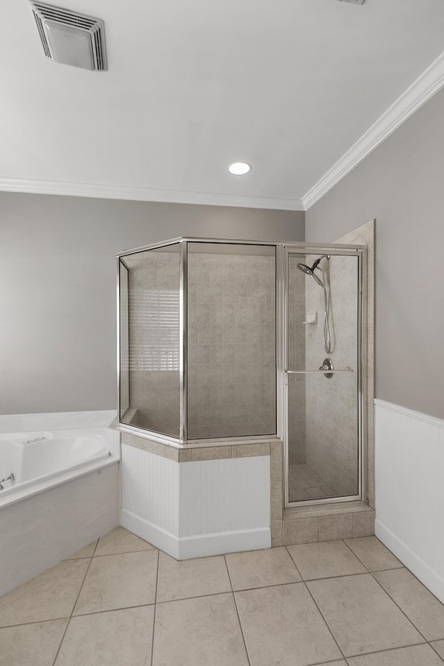 109 Glencoe Way, Dothan, AL 36305 - bathroom featuring tile patterned floors, crown molding, a shower stall, a bath, and recessed lighting