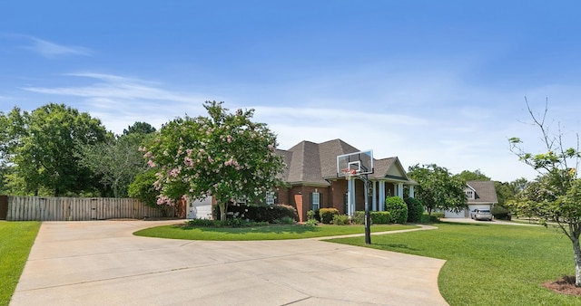 109 Glencoe Way, Dothan, AL 36305 - greek revival inspired property with concrete driveway, a garage, a gate, and brick siding