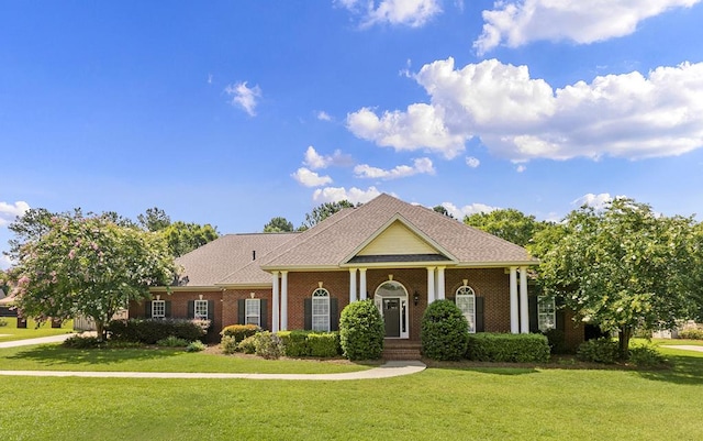109 Glencoe Way, Dothan, AL 36305 - neoclassical home with a front lawn and brick siding